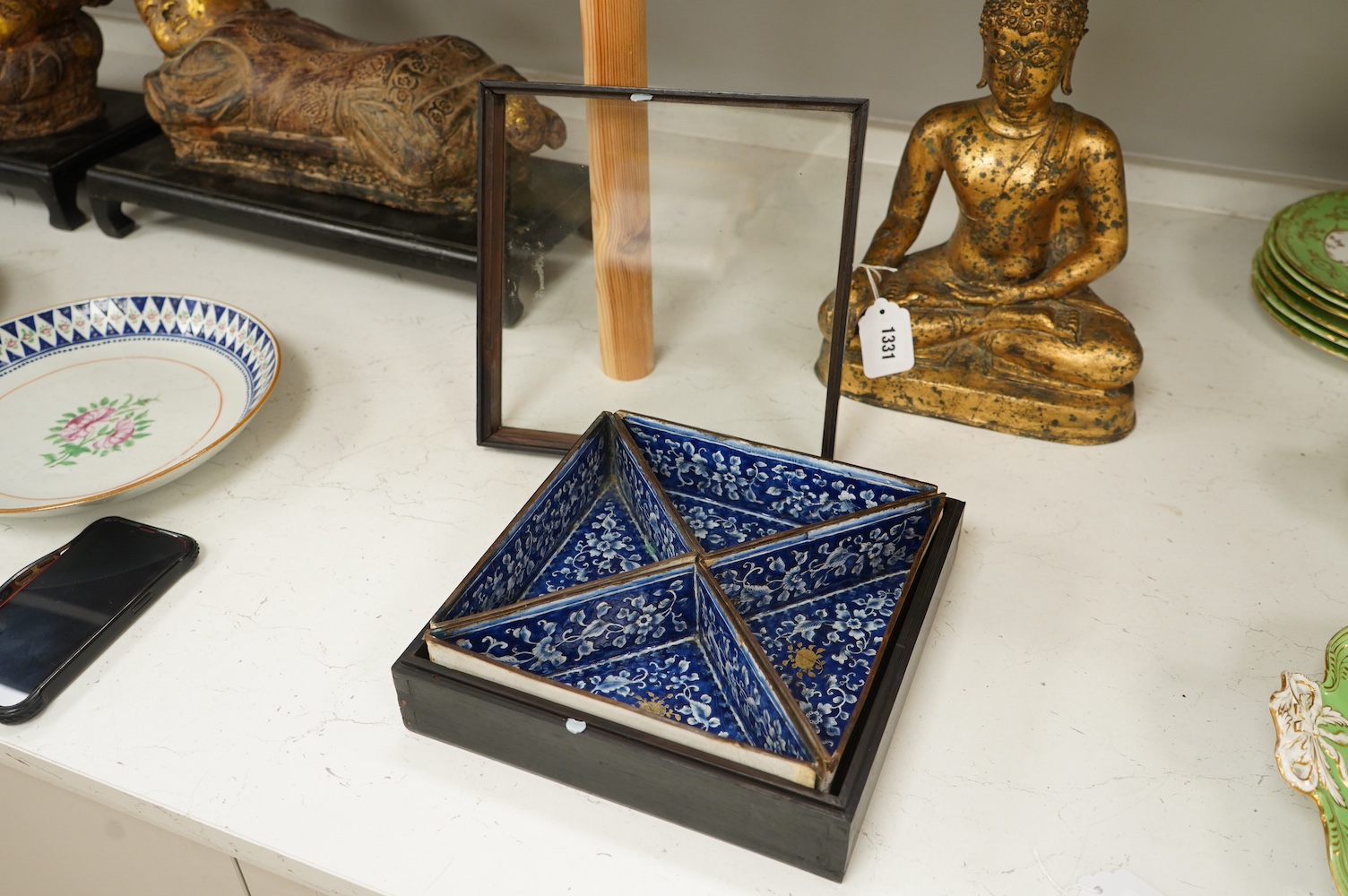 Four triangular 19th century Chinese Canton enamel sectional dishes, later boxed, 24cm wide overall. Condition - some restoration